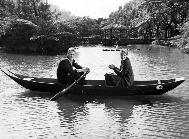 Holman and Eckert in rowboat